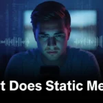 what does static mean concept with a man looking at his phone surrounded by digital noise and signal interference in a dark setting.