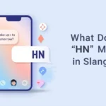 Red sour gummy bear candy with dripping green slime placed in front of a lychee-flavored candy package, used as a creative visual for the blog topic “What Does HN Mean in Slang?”.