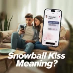 Two young adults sitting indoors looking at a phone with surprised and confused expressions, with a chat message showing “snowball kiss??” highlighting curiosity about the slang meaning.