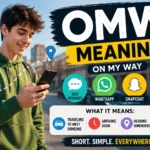 Featured image illustrating the meaning of OMW (On My Way) with a young man checking his phone, highlighting the abbreviation's use in text messages, WhatsApp, Snapchat, and Instagram to indicate someone is heading to a destination.