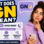 What does GN mean? A young woman holding a smartphone beside bold "GN" text, illustrating the most common meaning "Good Night" and its possible uses in texting, social media, and online conversations.
